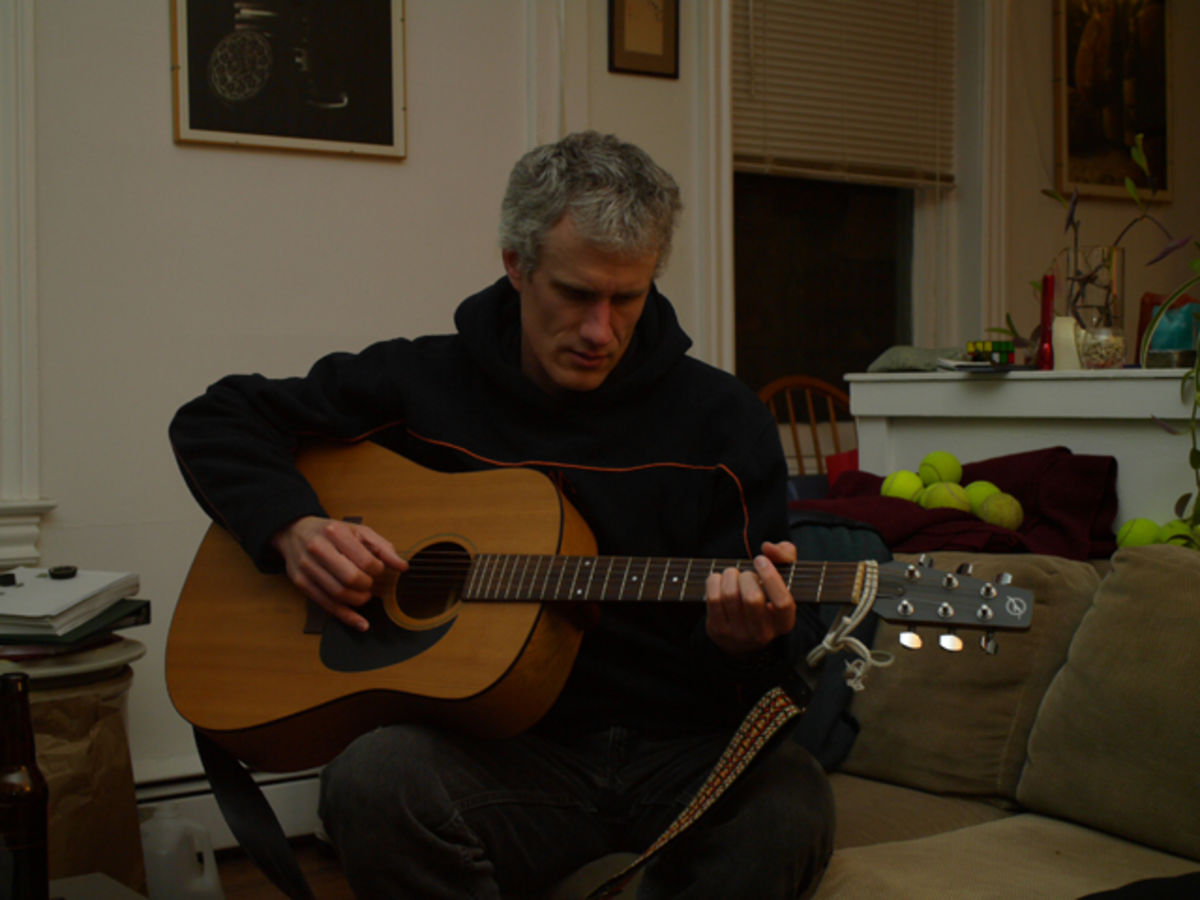 Jon playing guitar
