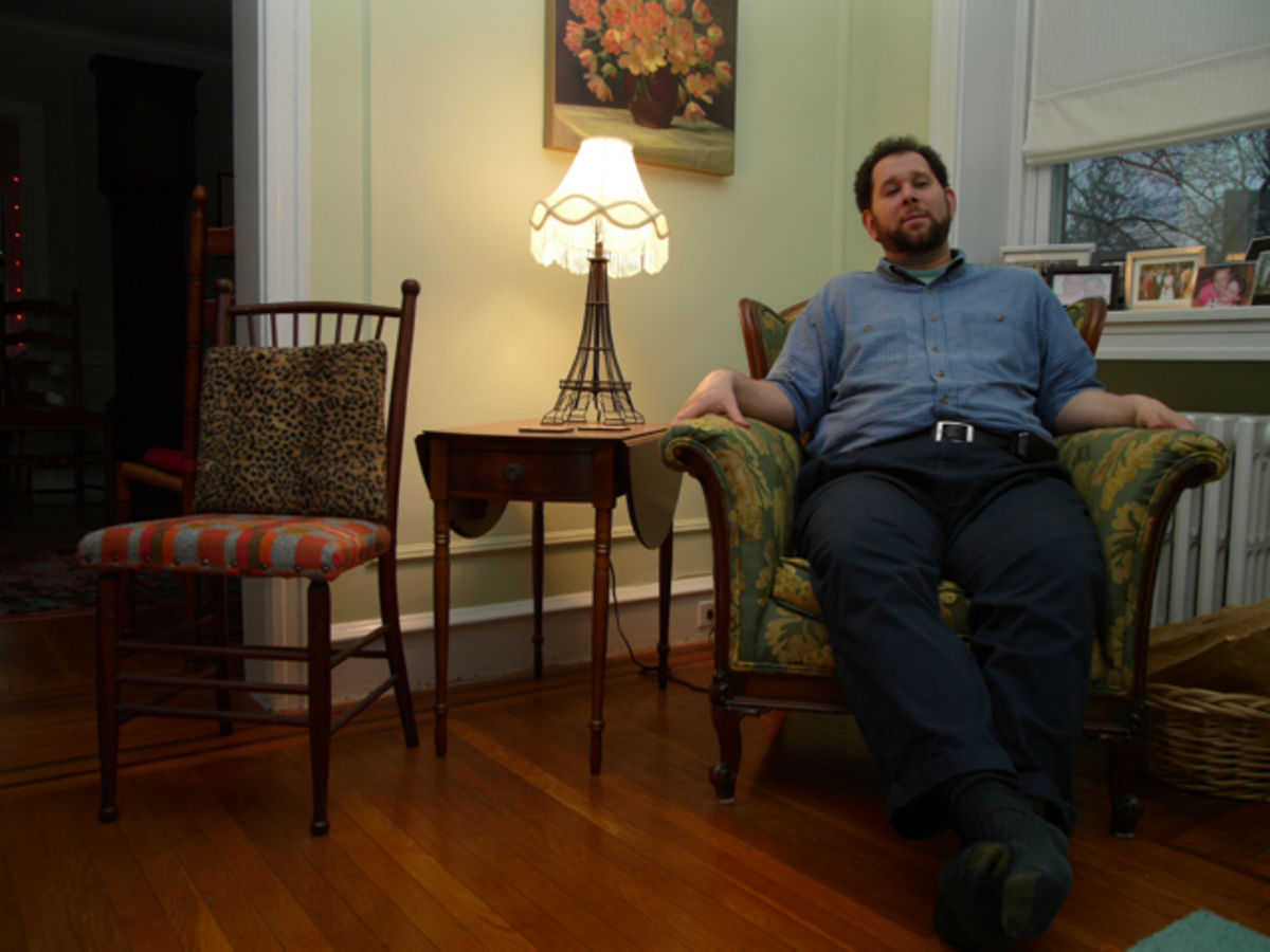 Ken sitting in the living room