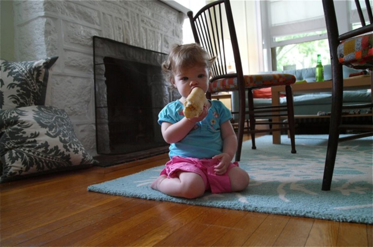 Lily eating bread