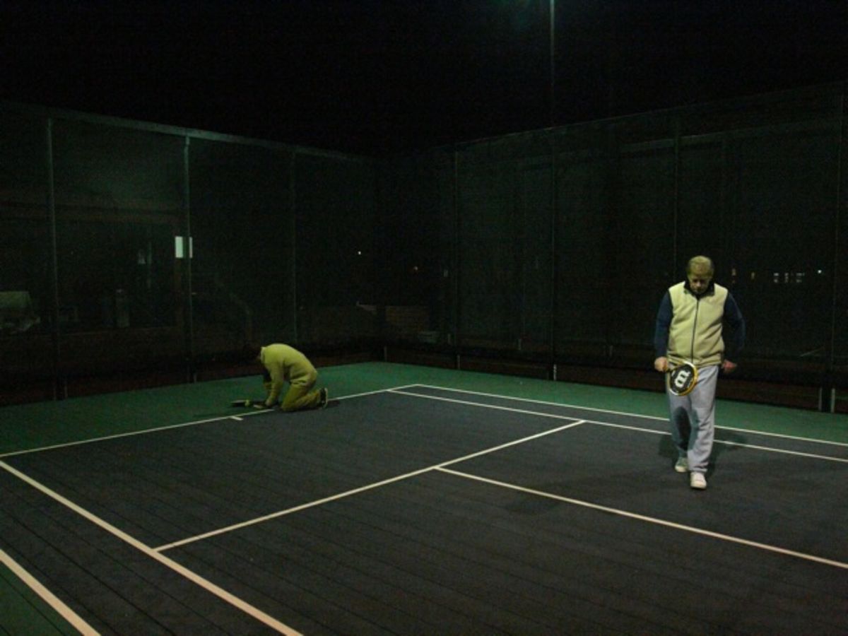 Andy and Billy playing paddle tennis